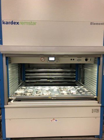 automated vertical lift module by Kardex Remstar storing parts in warehouse